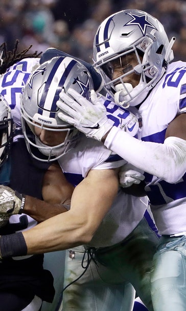 Elliott, Prescott lead Cowboys past Eagles 27-20